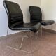 Black leather armchairs, Italian design, 70s (X2)