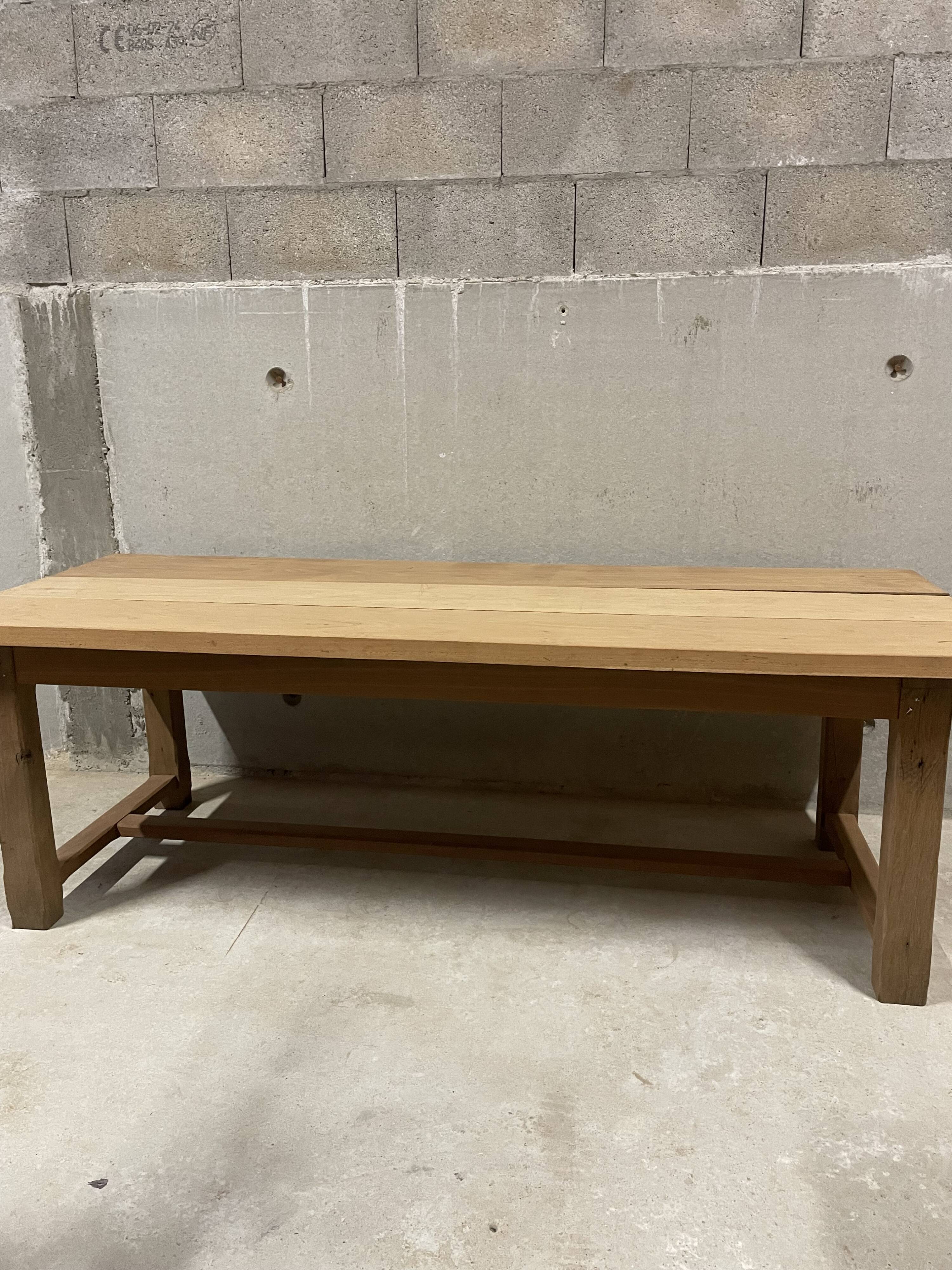 Large convivial solid wood table – ideal for big gatherings.