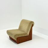 Vintage mid-century beige armchair with wooden frame and ottoman