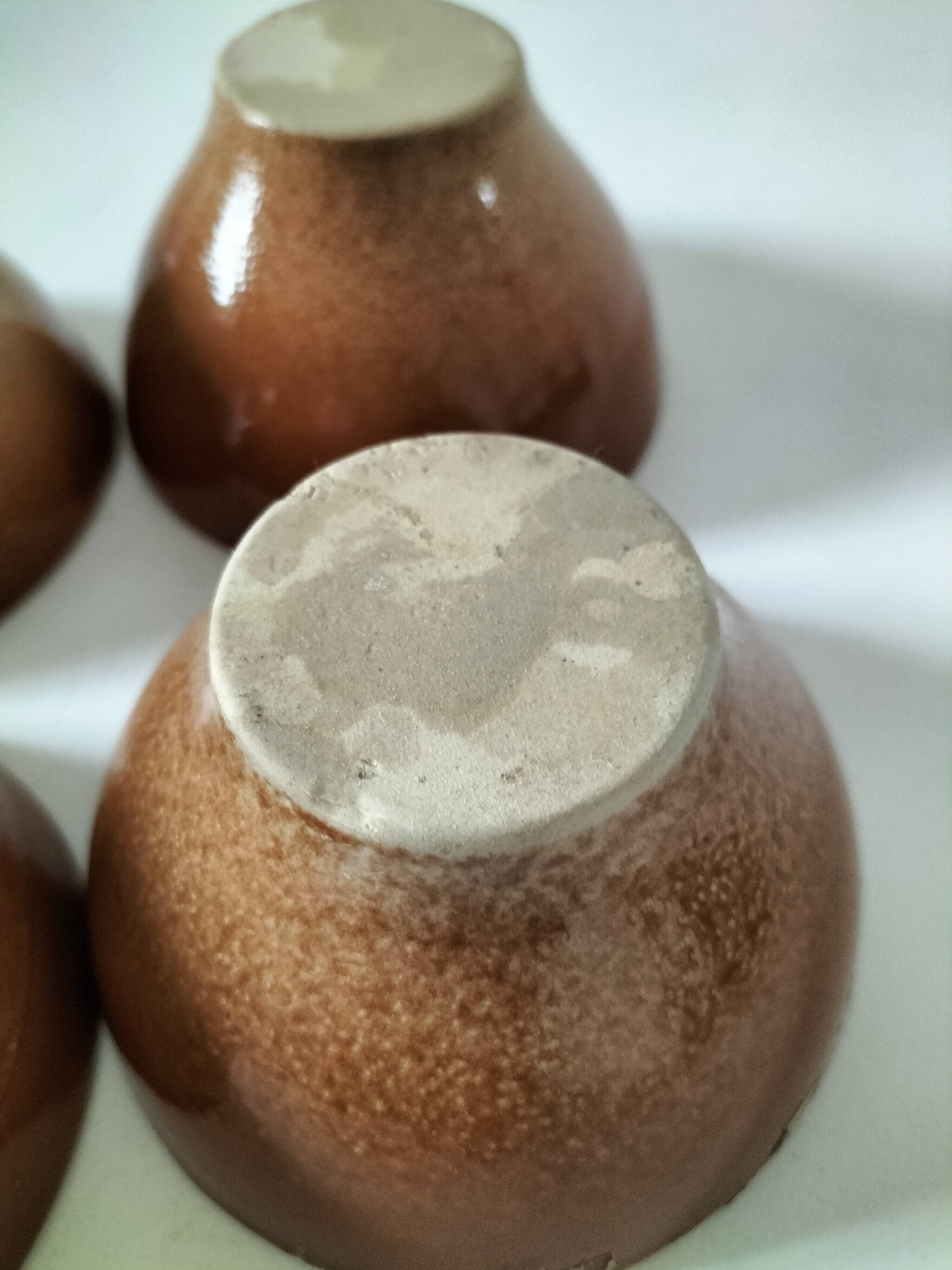 Set of 4 small glazed earthenware bowls