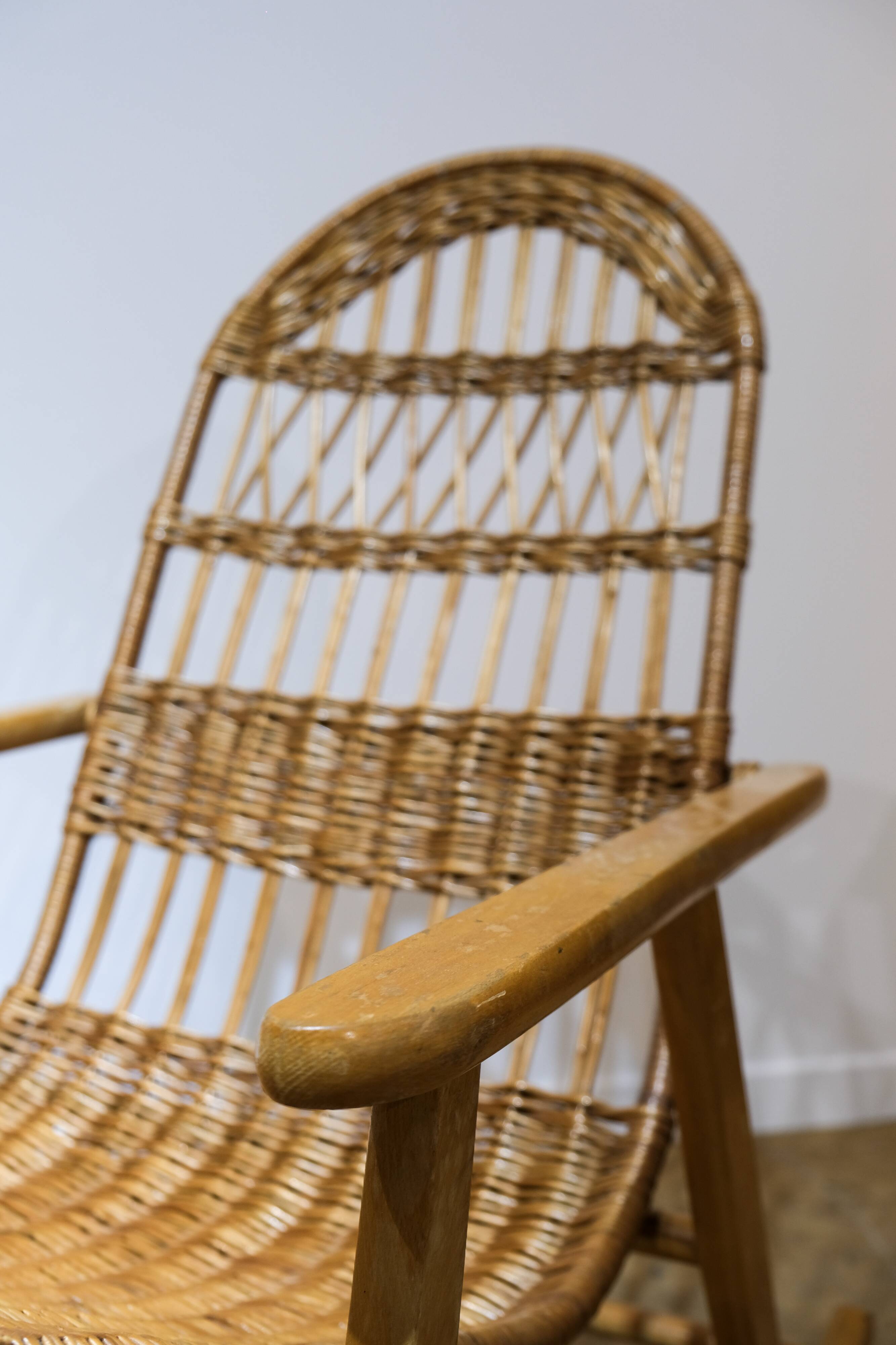 Wicker and wood rocking chair