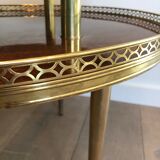 Neoclassical style tripod pedestal in mahogany, brass