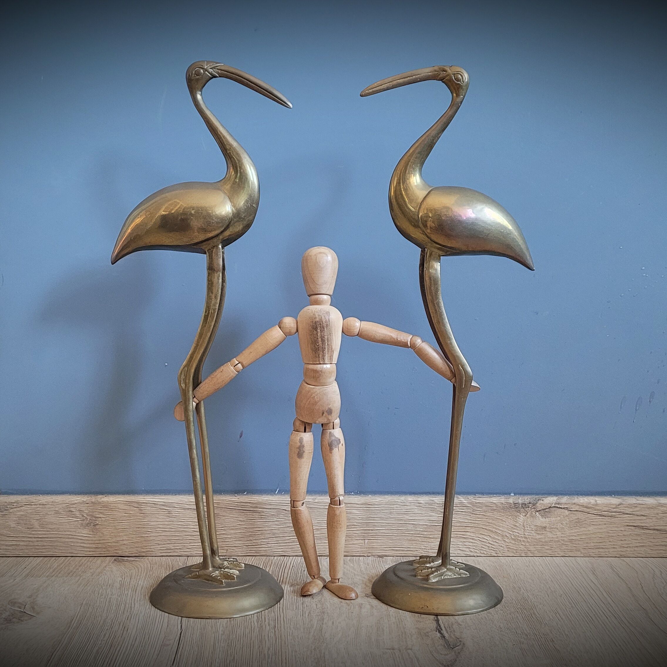 Duo brass herons