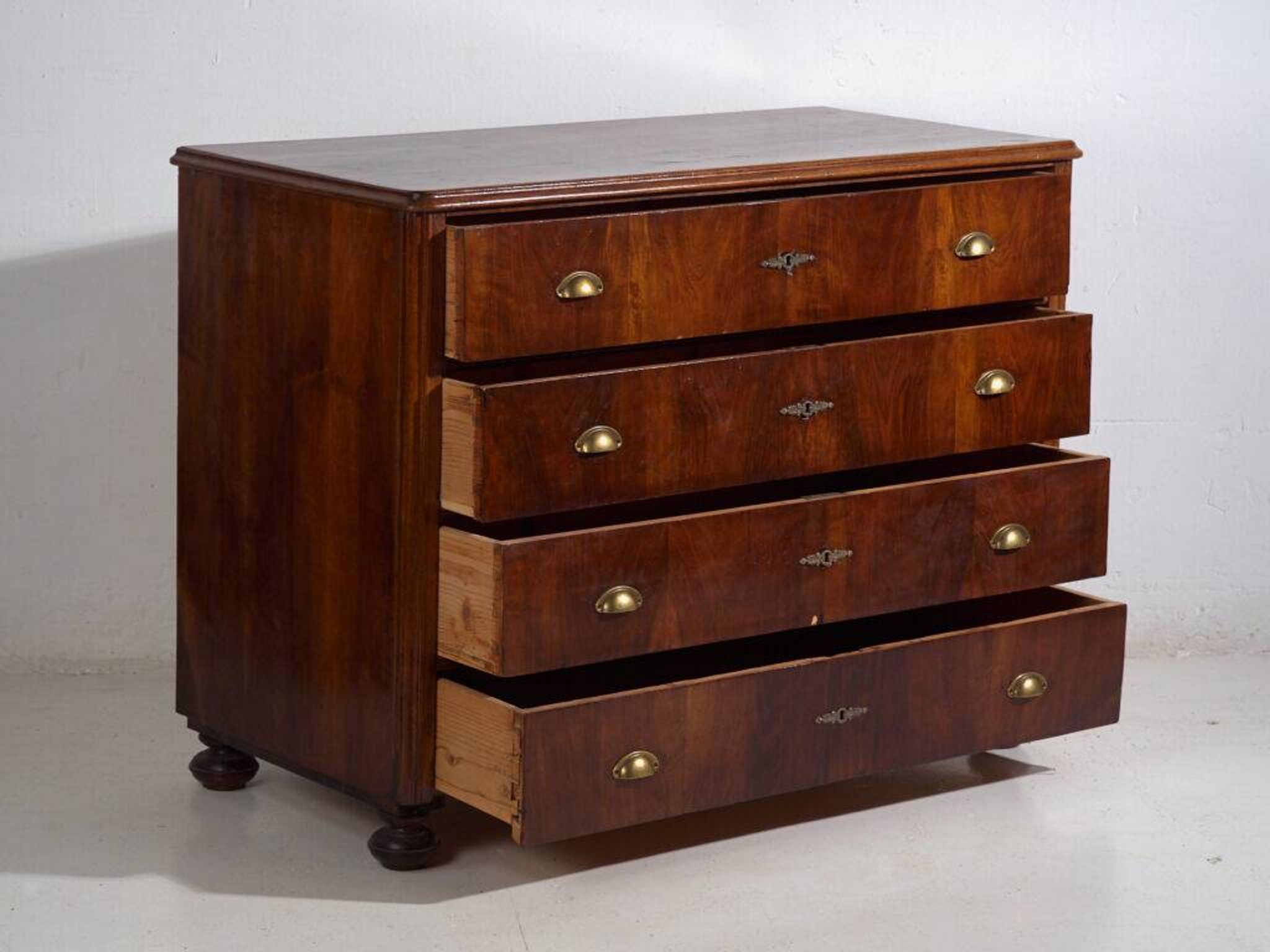 Antique pine chest of drawers with four drawers and brass handles – Central Europe, circa 1900
