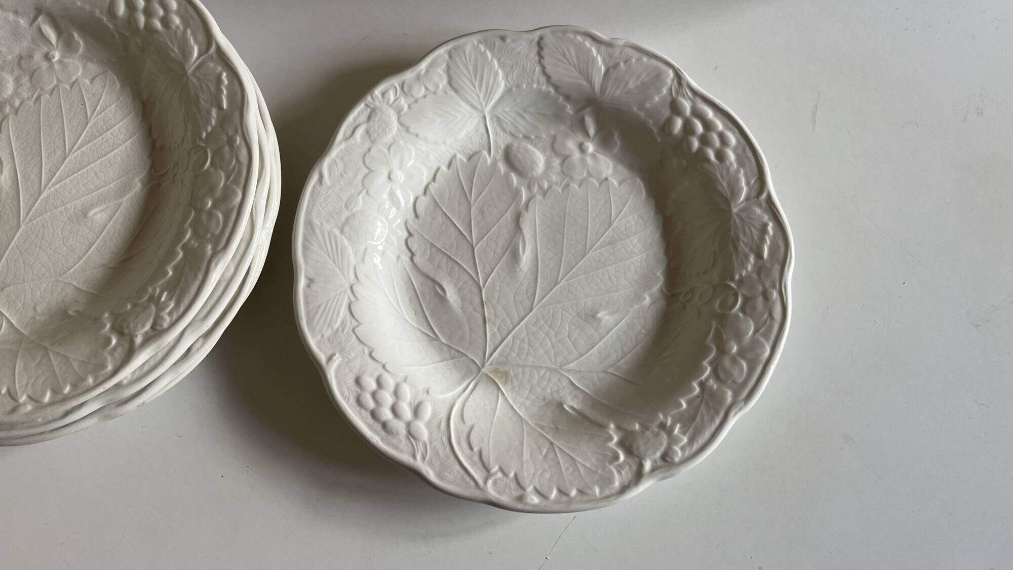 Set of 5 English earthenware plates by Burleigh Davenport with raised leaf design.