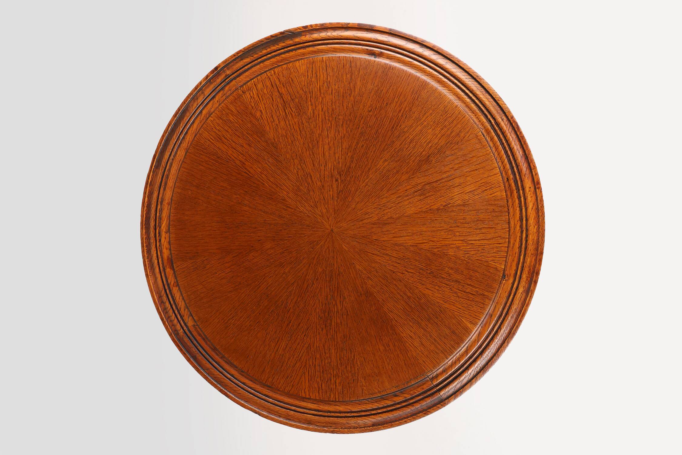 Antique English hand carved circular oak side table with lions head feet