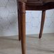 Art Deco caned chair with bronze ornaments.