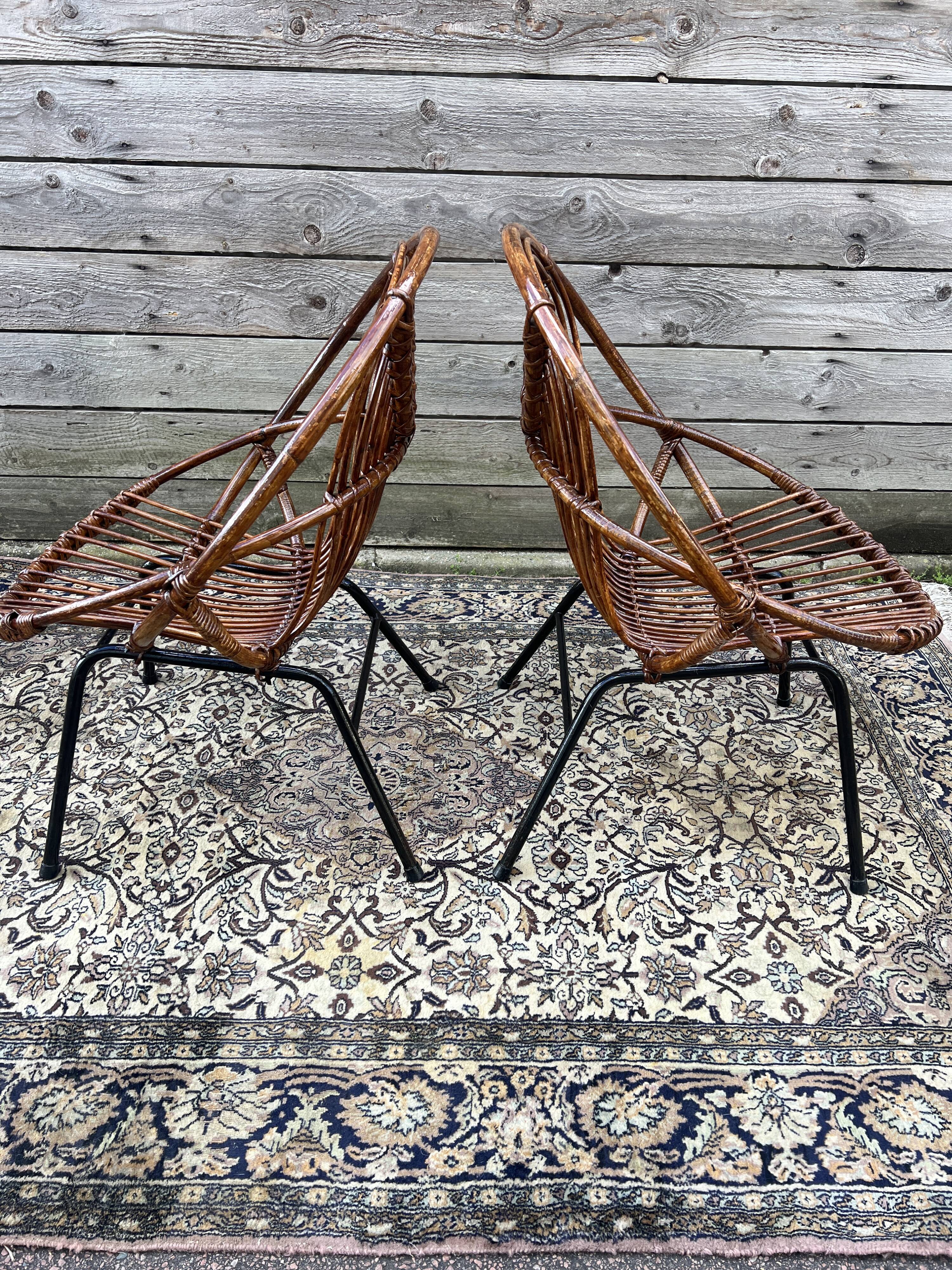 Pair of rattan armchairs, metal legs CIRCA 1950