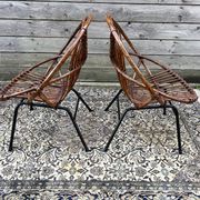 Paire de fauteuils en rotin, pieds métal CIRCA 1950