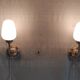Articulated brass and opaline wall lights - mid 20th century.