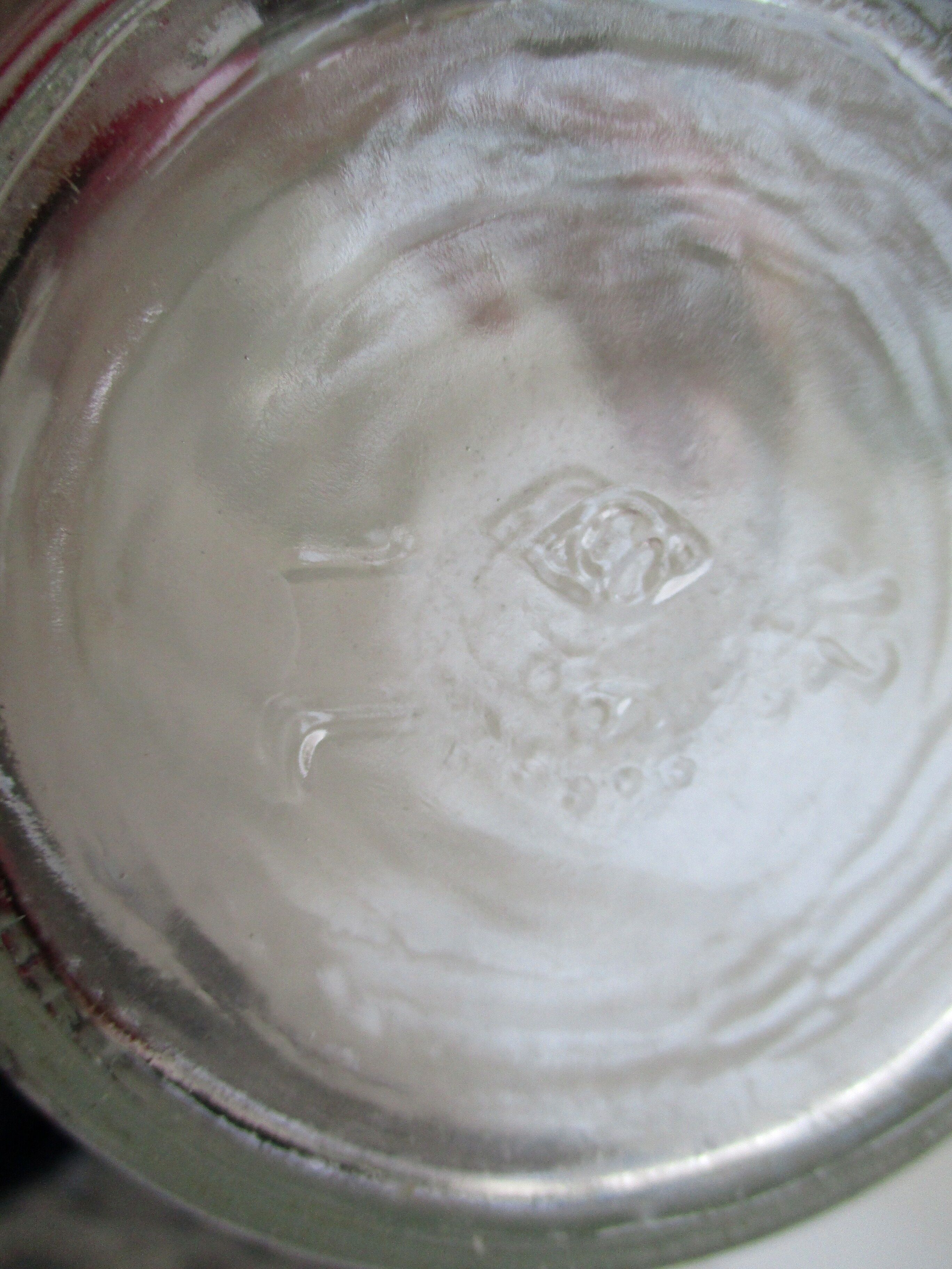 Vintage milk bottle in clear glass