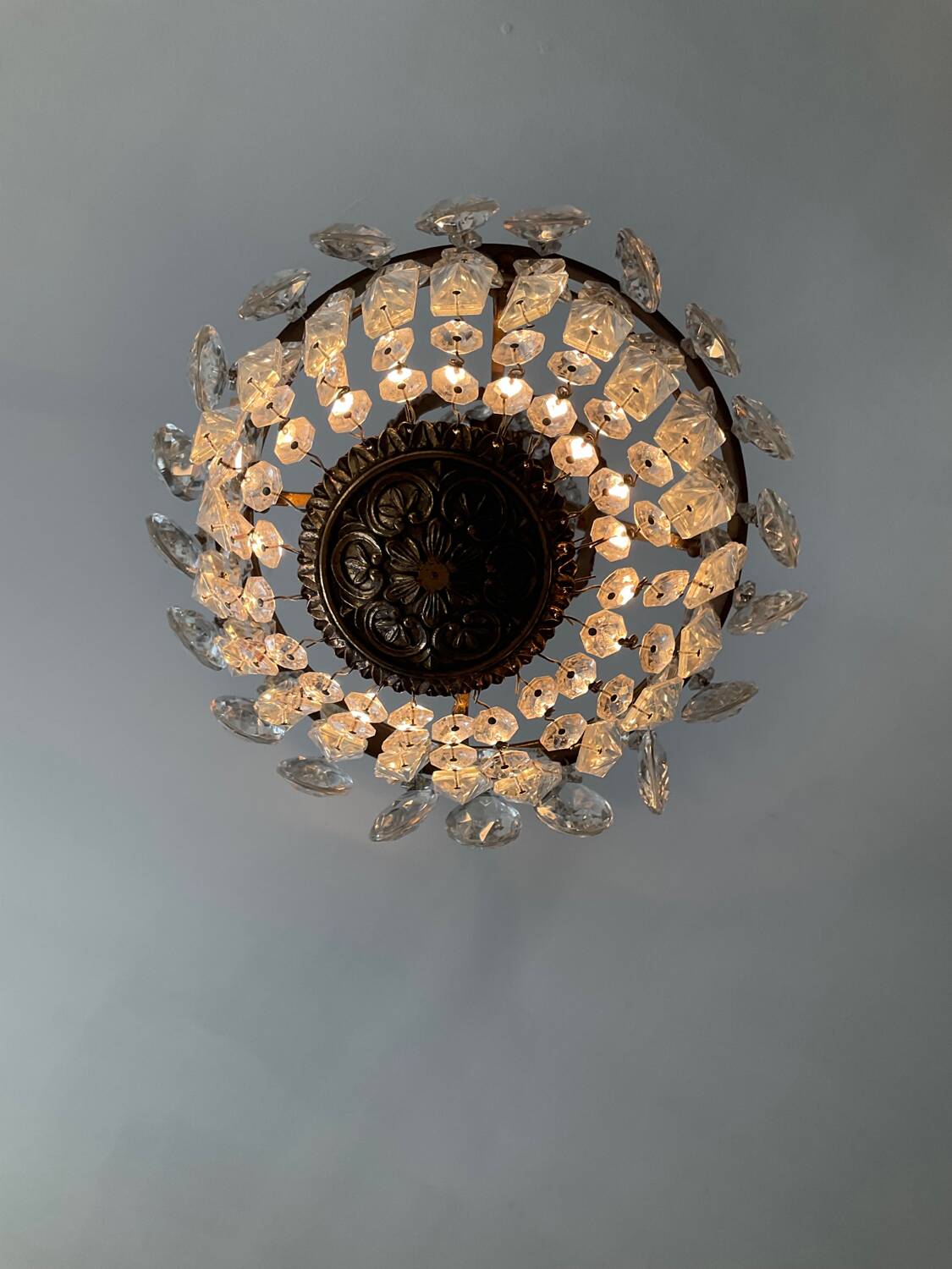Old bronze basket chandelier with tassels