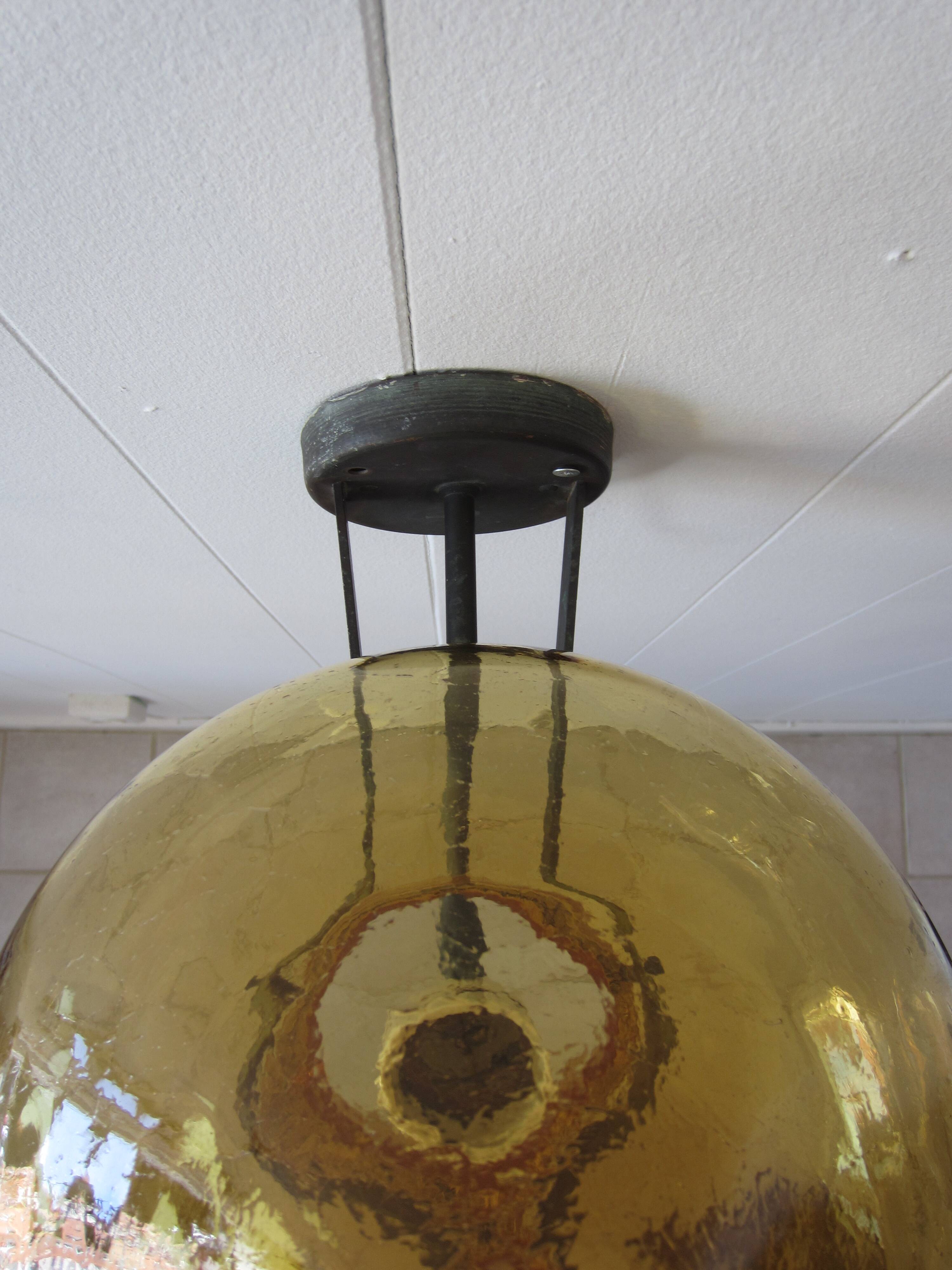 Scandinavian outdoor wall light in copper and amber glass