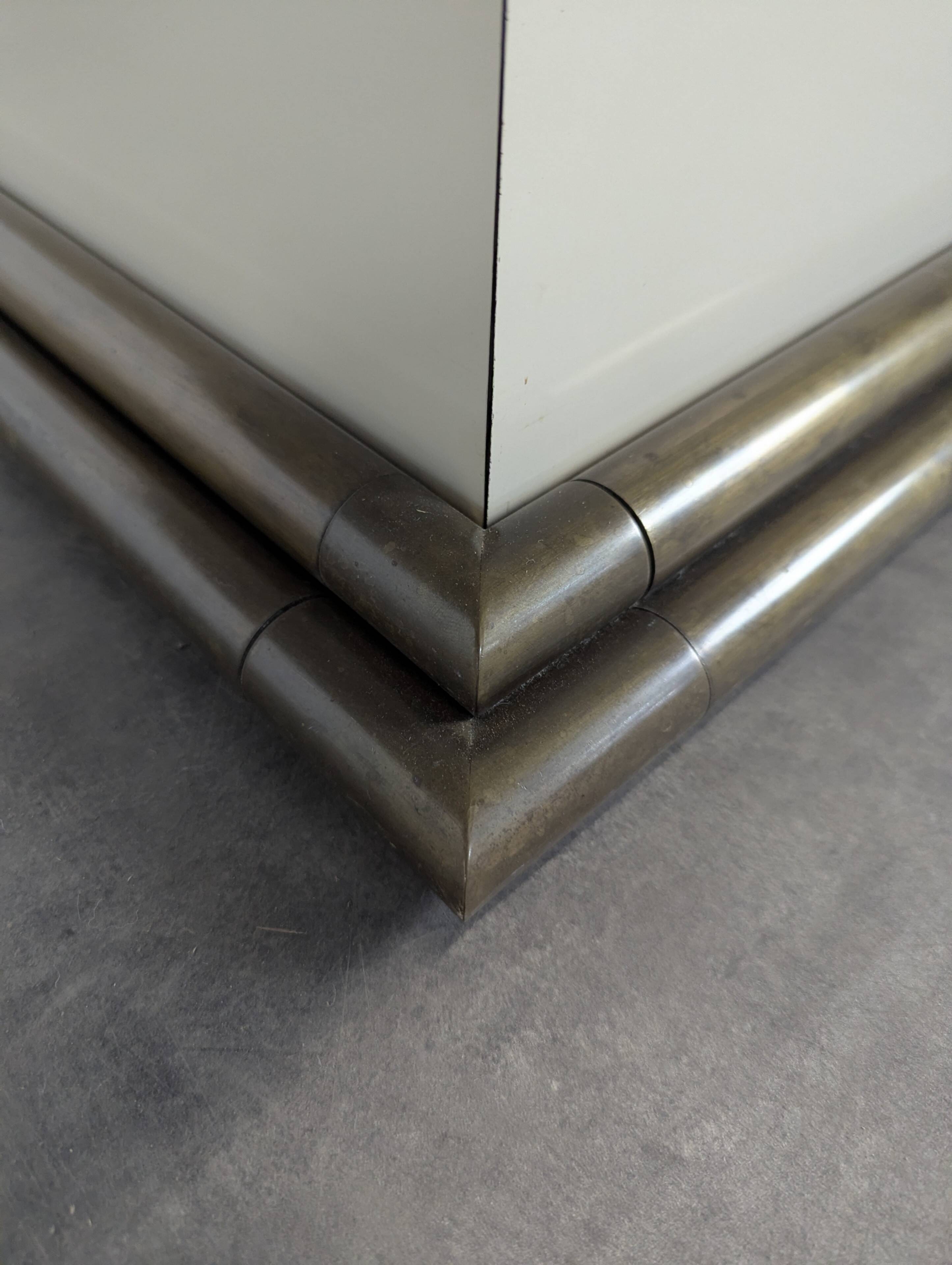 1980s coffee table made of brass tubes and laminate.
