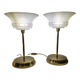 Art Deco table lamps with frosted glass shade and brass base.