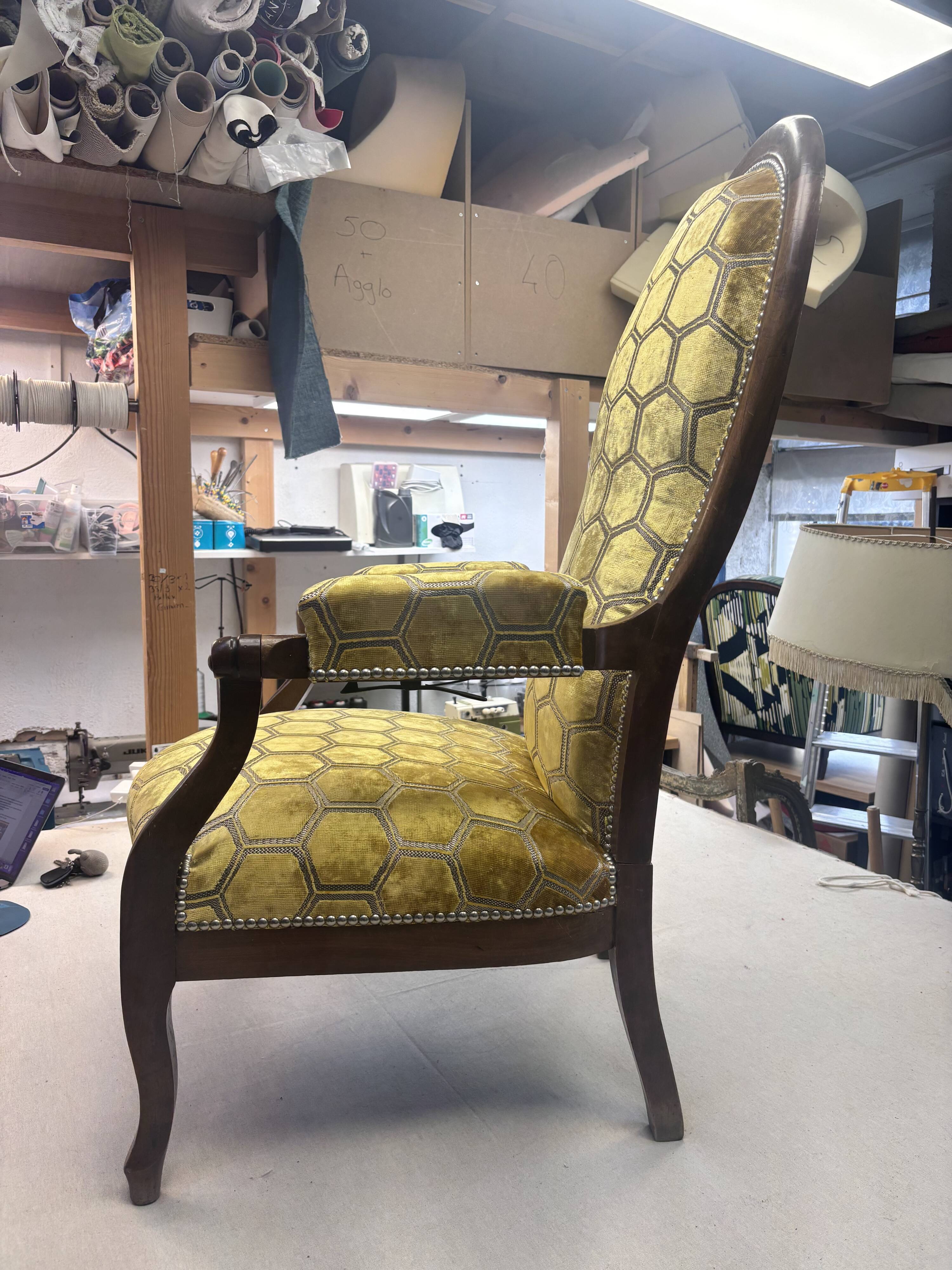 Voltaire armchair with a rack mechanism