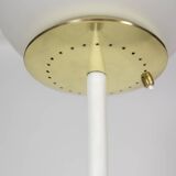 Floor lamp in opaline, lacquered metal and golden brass. 1950s.