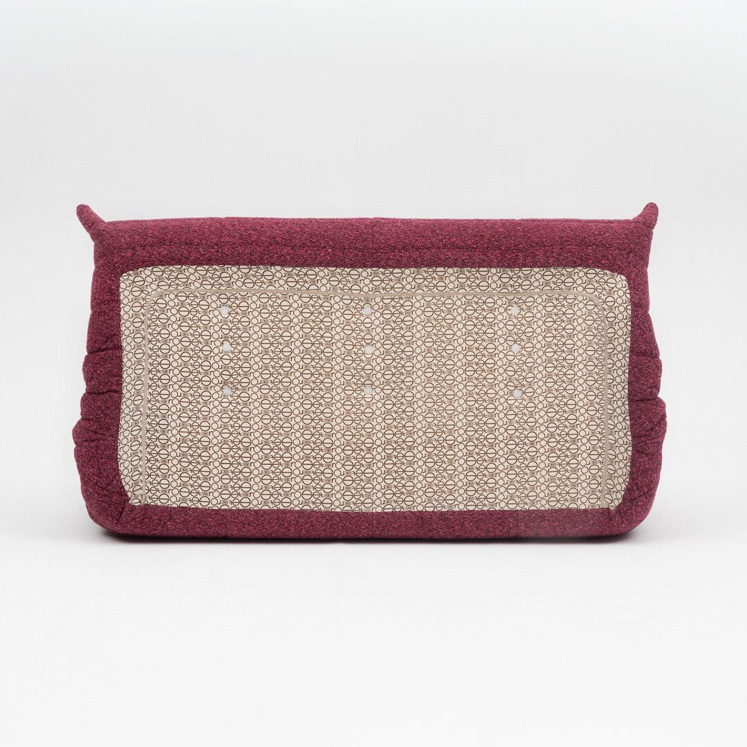 Canapé trois places Togo en bouclé bordeaux par Michel Ducaroy pour Ligne Roset