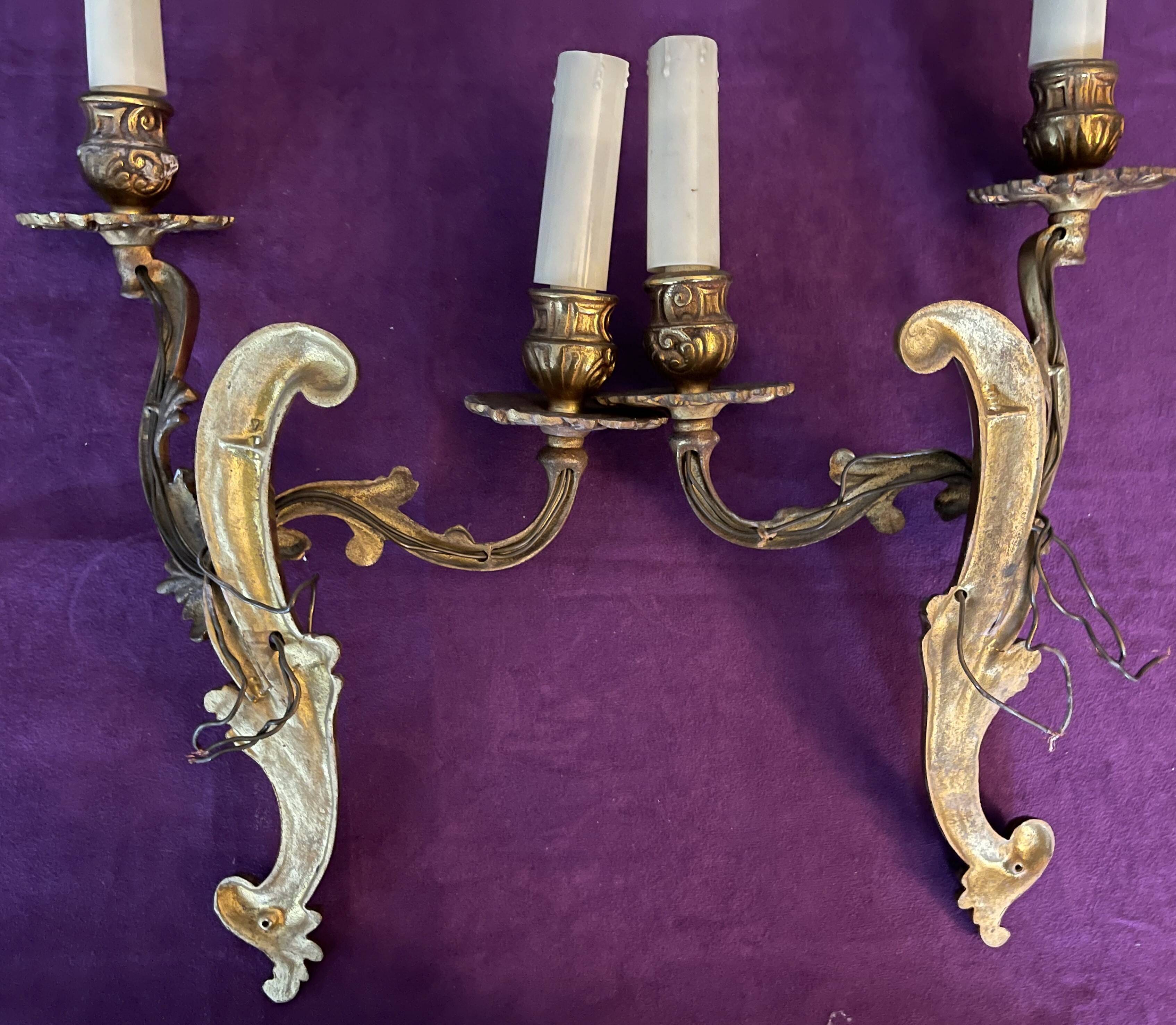 Pair of gilded bronze wall lights, 1950