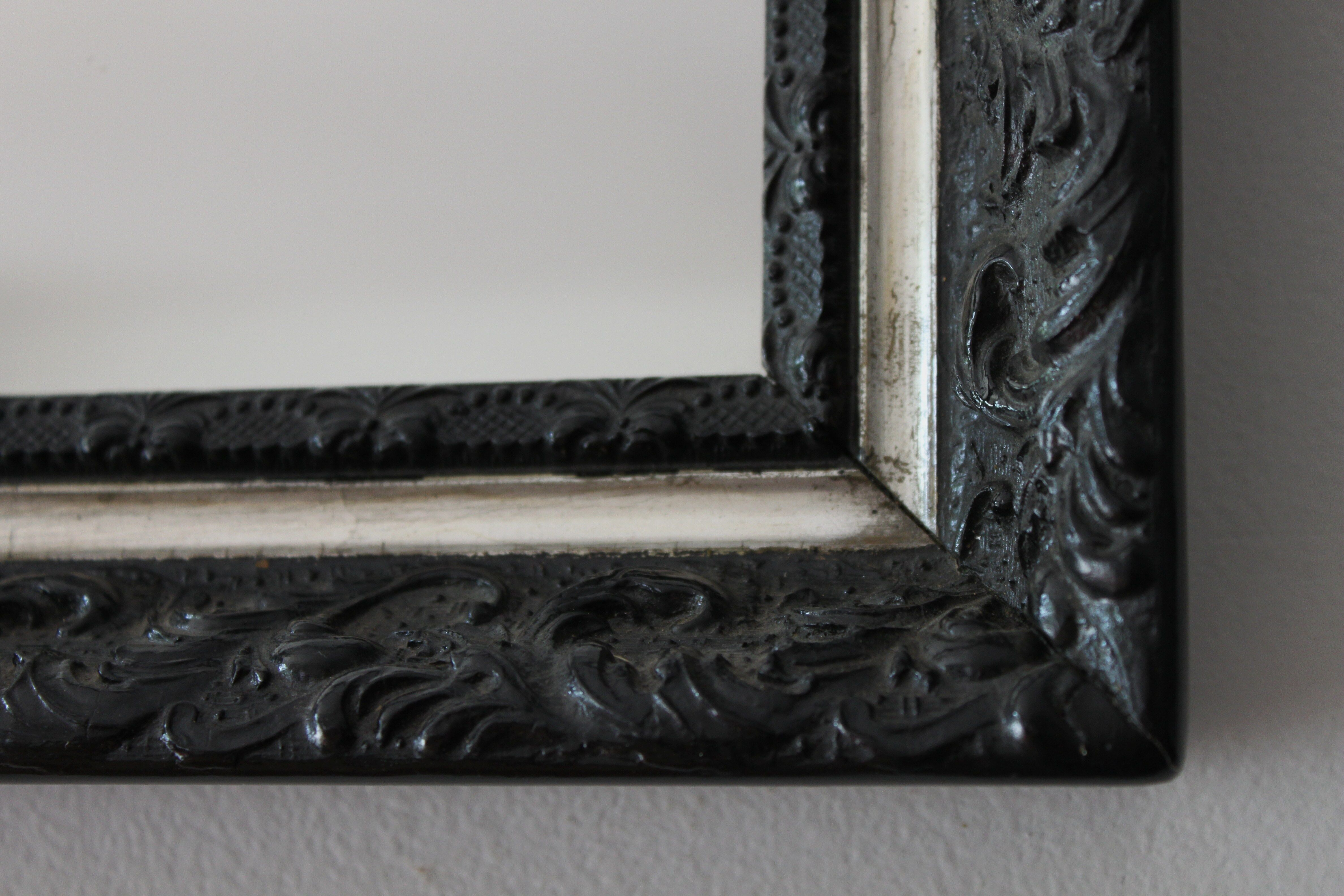 Black and silver mirror