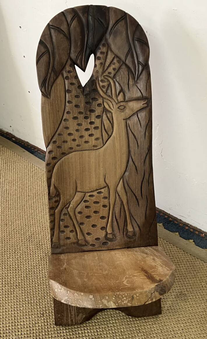 African carved wooden palaver chair