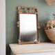 Antique rattan mirror