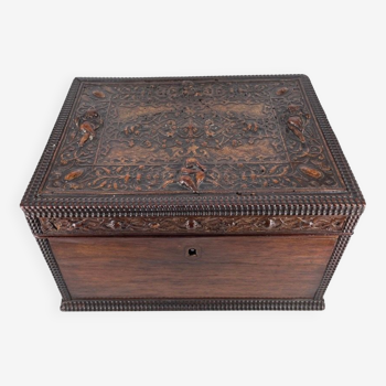 Wooden box decorated with leather decorated with cherubs circa 1920