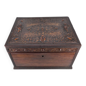 Wooden box decorated with leather decorated with cherubs circa 1920