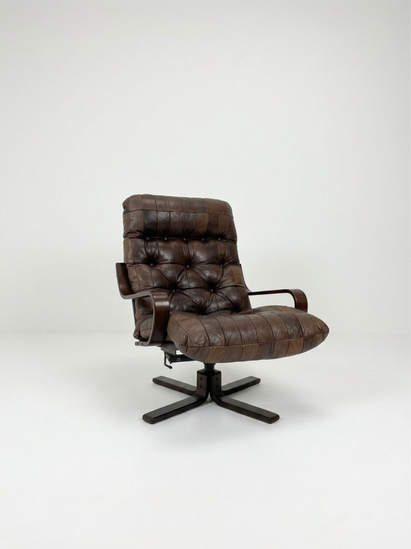 Mid-century leather swivel chair
