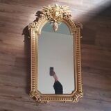 Gilded mirror signed Vincenzo Fancelli