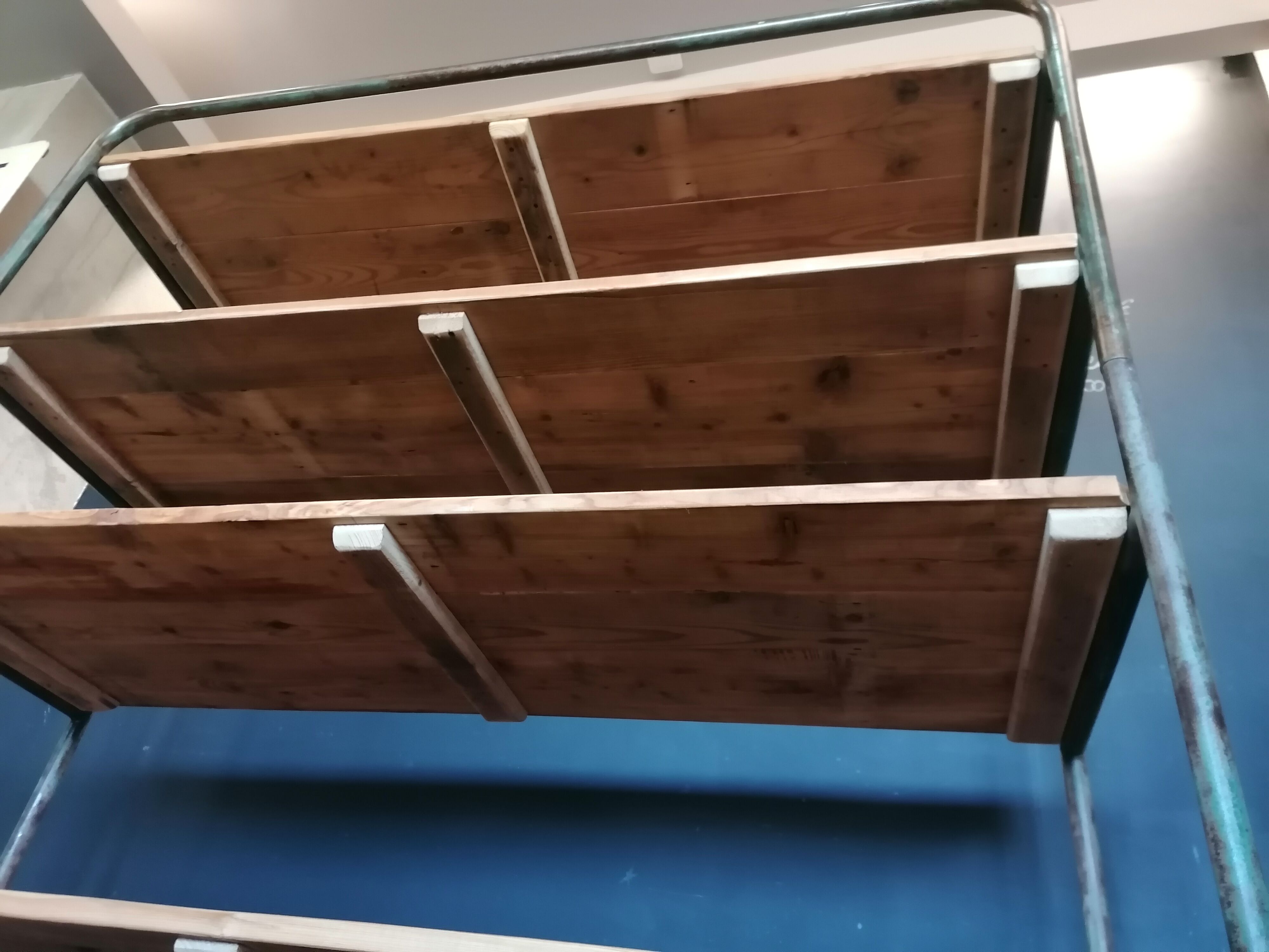 Steel and wooden shelf on wheels