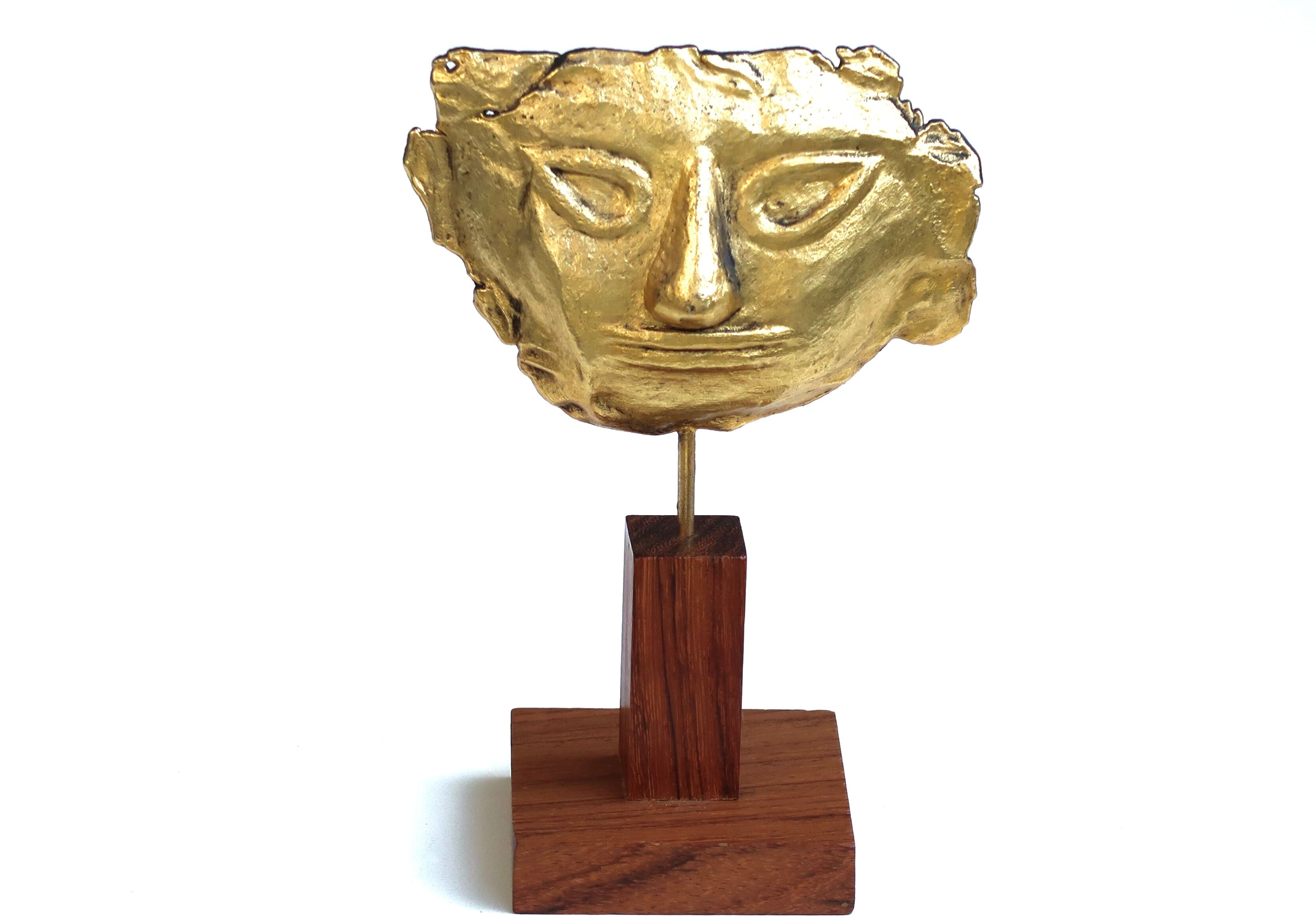 Mayan mask sculpture in gilded metal, 70 cm