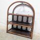 Brown rattan wall shelf, 3 levels