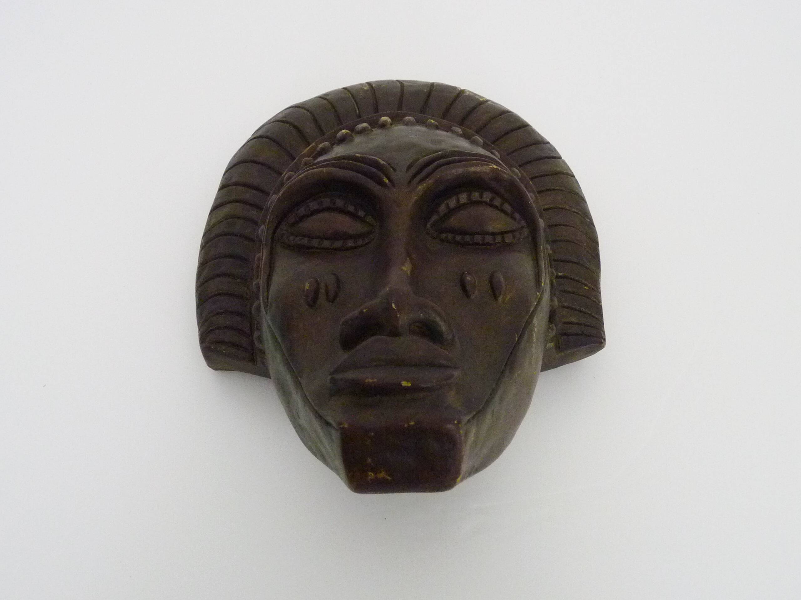 African style terracotta mask signed Siki