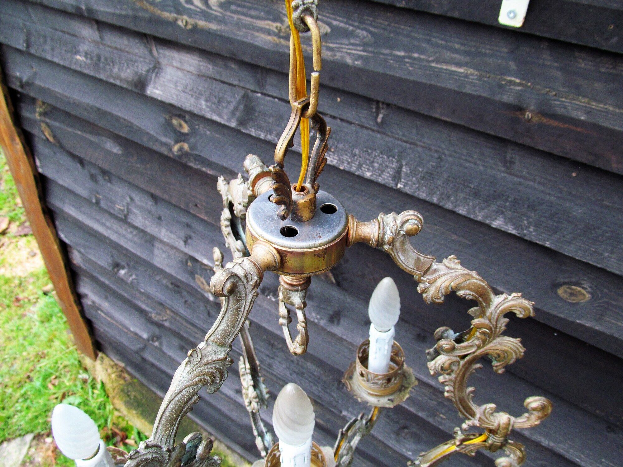 Italian Vintage patinated bronze chandelier with 4 lights with a beautiful wow patina