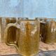 Set of 5 brown stoneware mugs