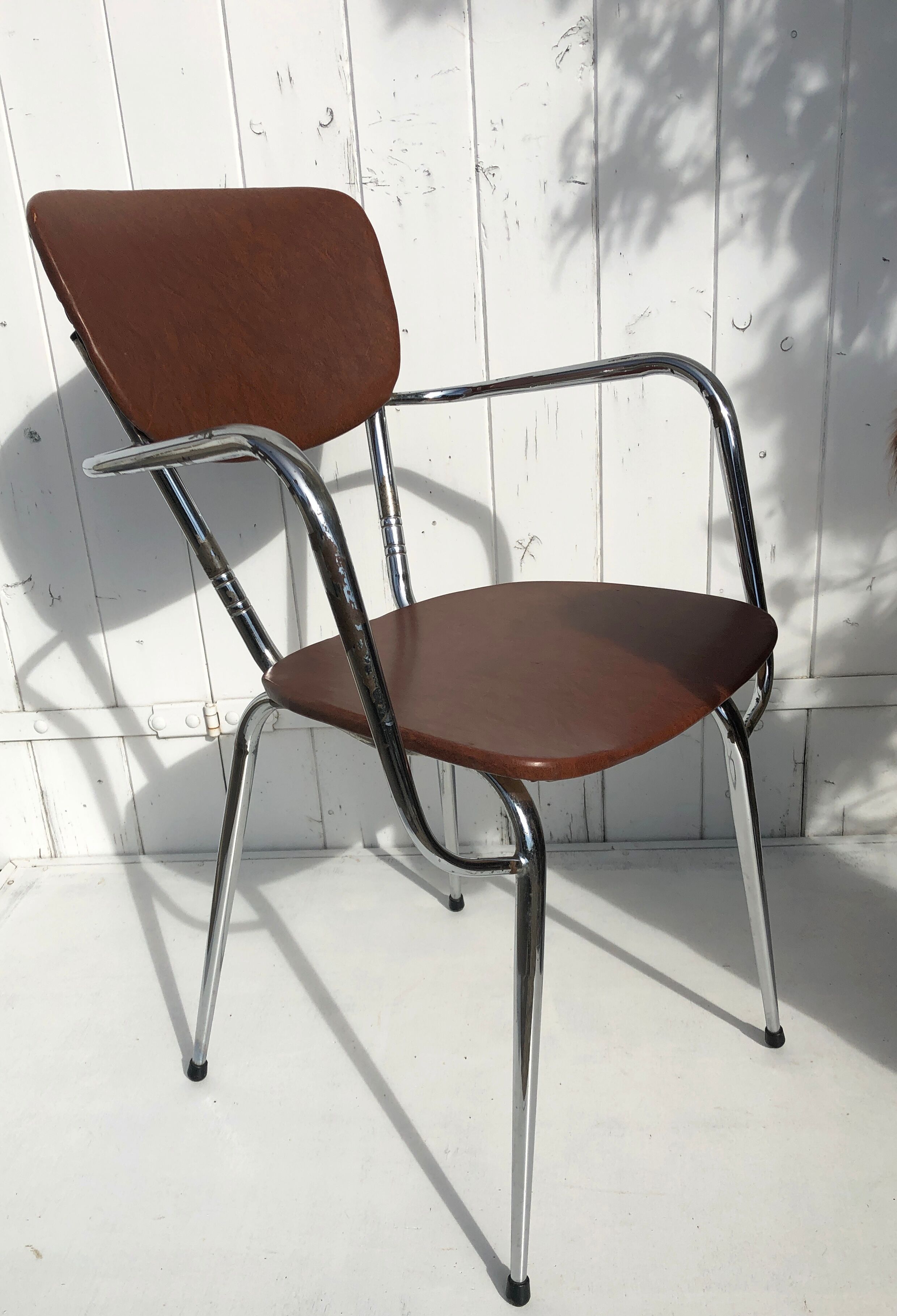Vintage chair with armrests