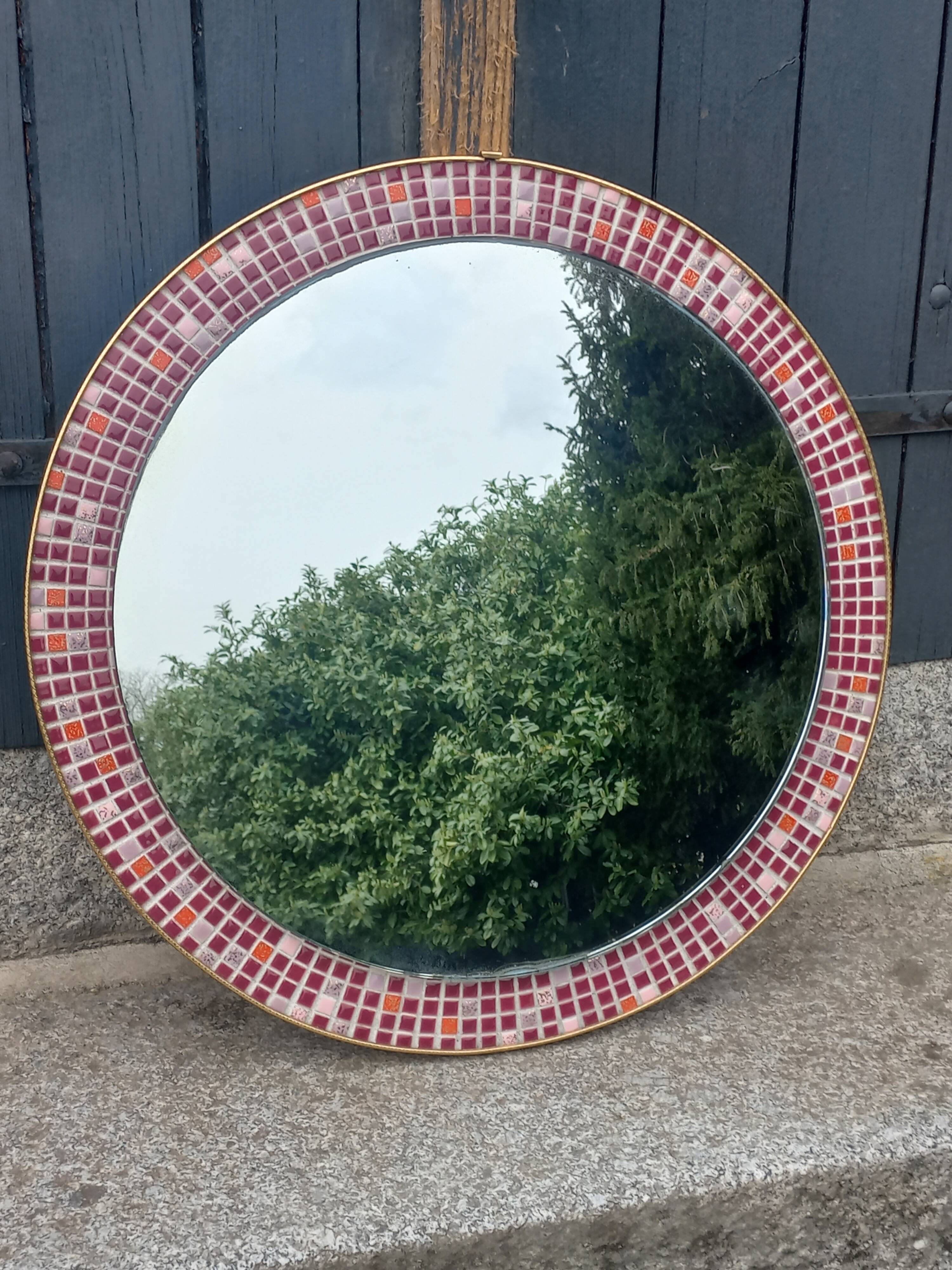 Vintage ceramic mirror from the 1960s.