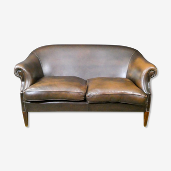 Vintage leather 2-seater sofa in dark brown