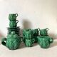 Antique slip cups with saucers, sugar bowl and milk pitcher