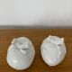 Pair of porcelain egg-shaped pocket trays