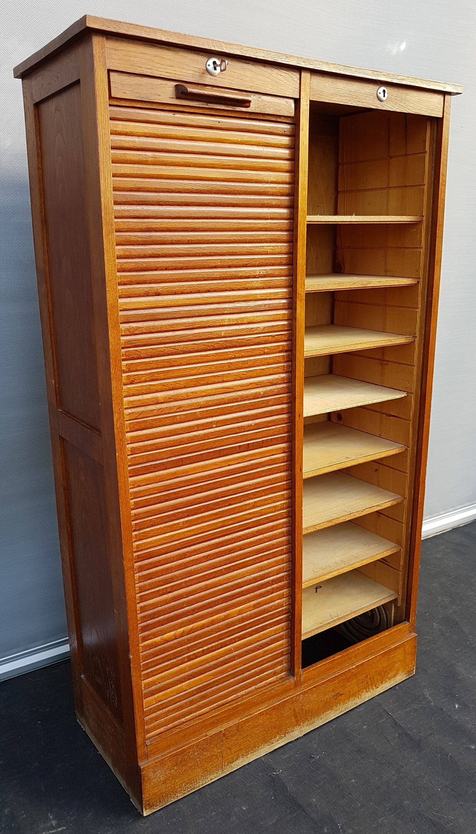 Furniture with double curtain columns 1930