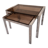 Vintage 1970s nesting tables in chrome and smoked glass, mid-century modernist style