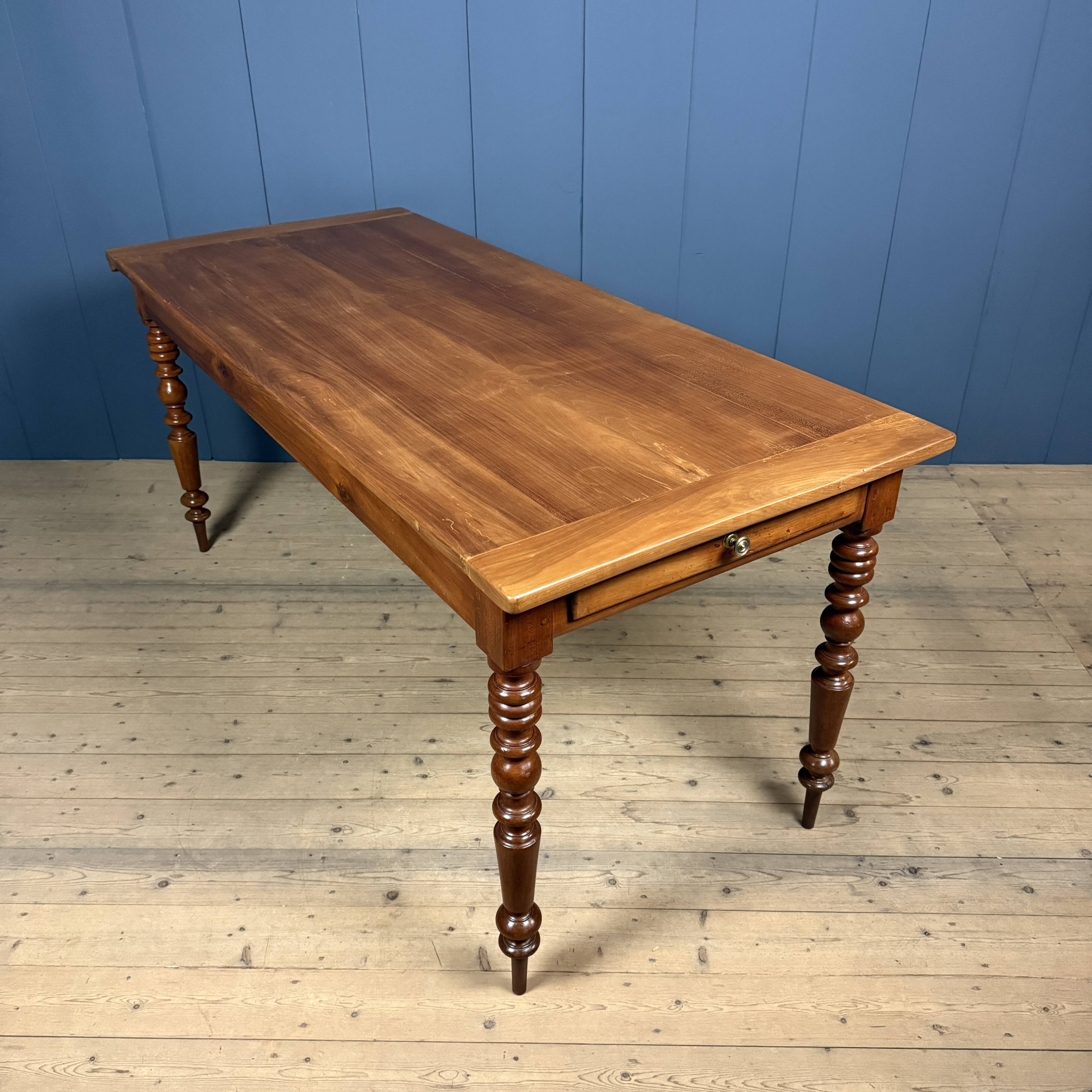 Antique cherry wood dining table from France.