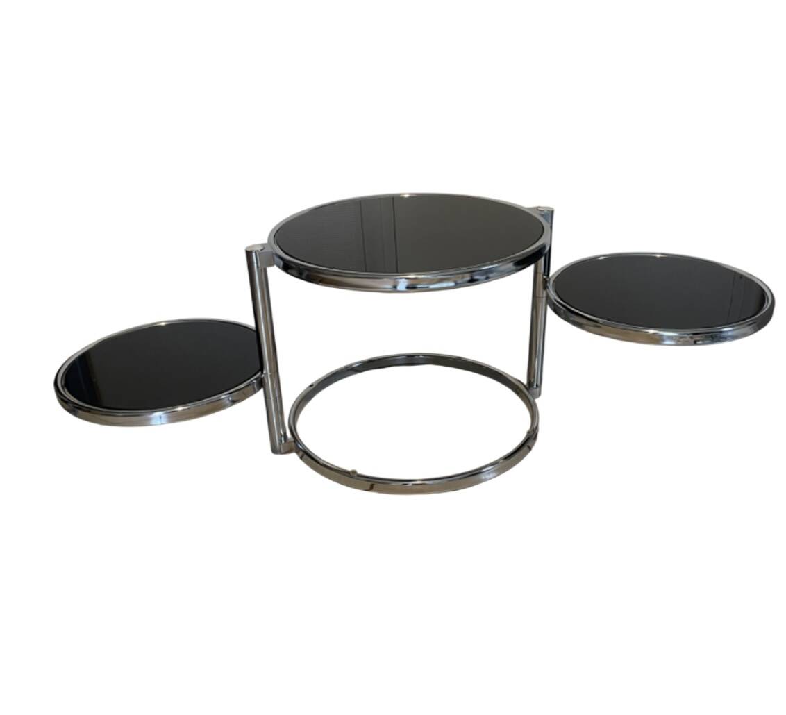 Coffee table with 3 chrome and smoked glass tops.