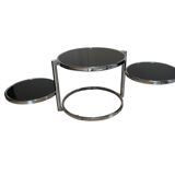 Coffee table with 3 chrome and smoked glass tops.