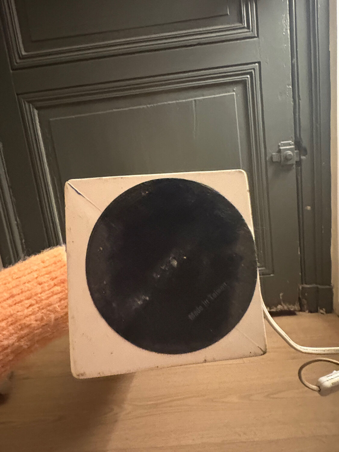 Corinthian column lamp base in blue with a lampshade of dried flowers.