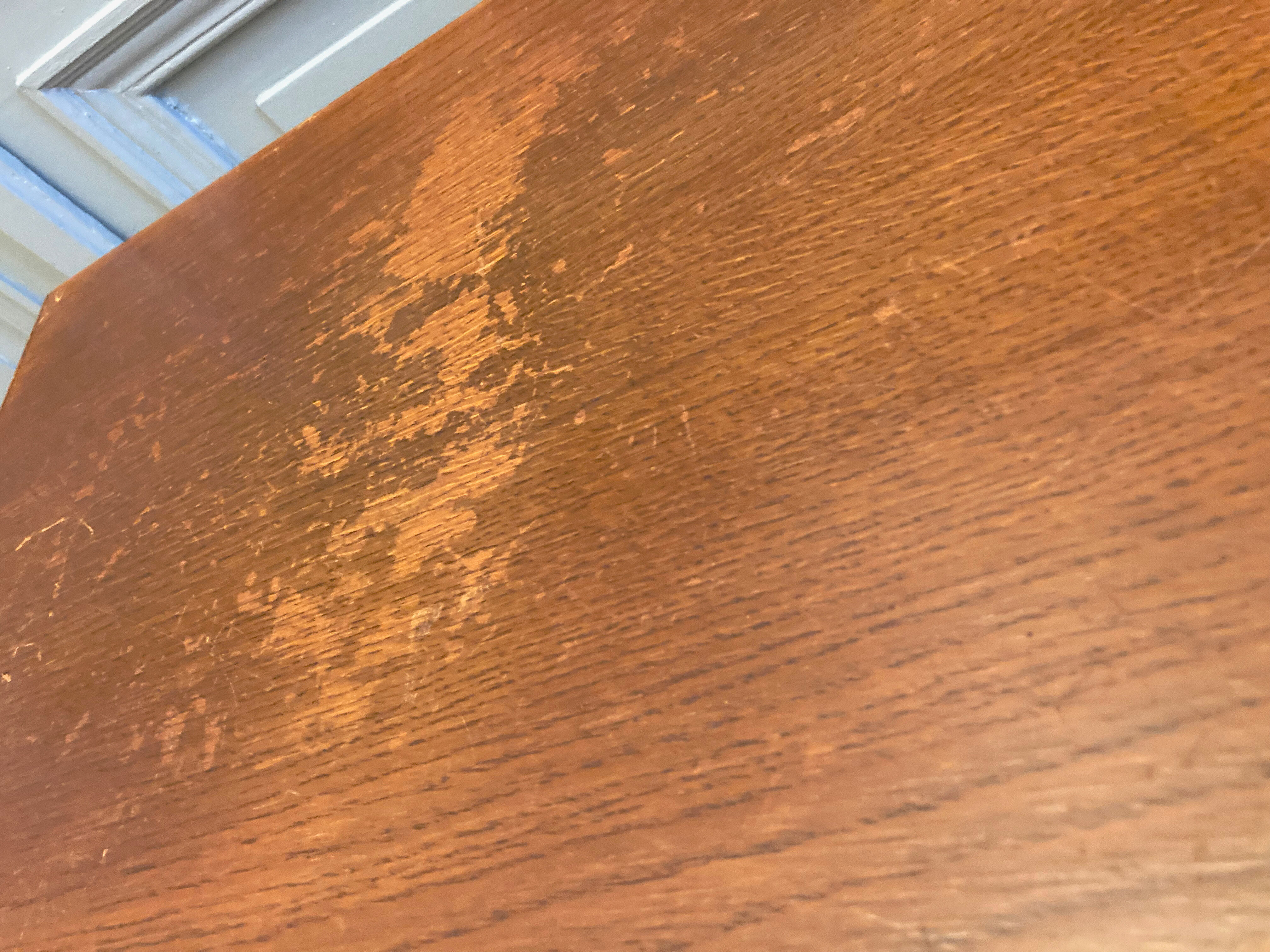 Square pedestal table with central foot 1930