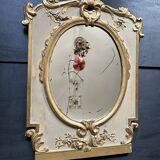 Napoleon III mirror in carved gilded wood, oval mercury glass.