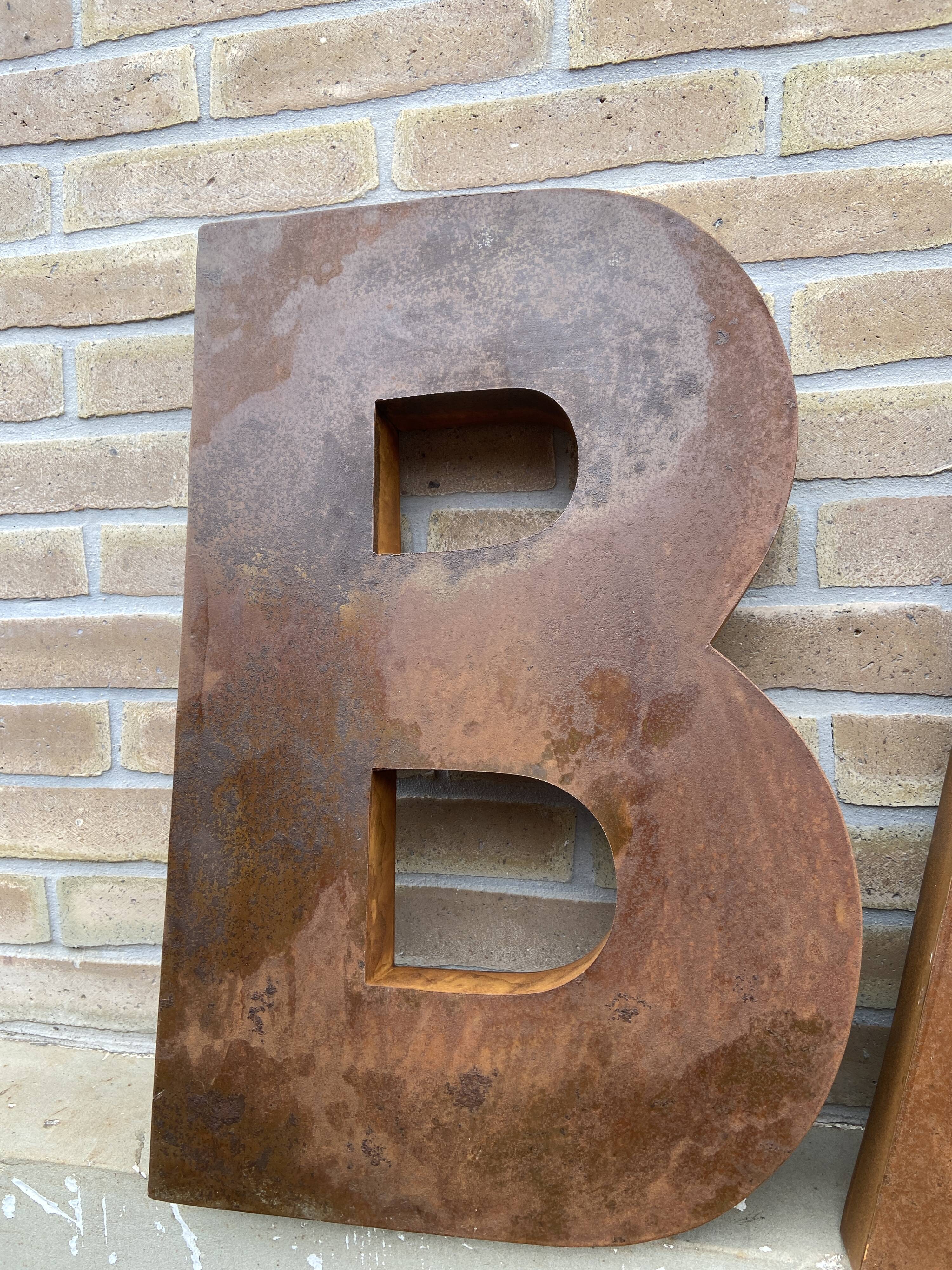 Bar sign in vintage metal letters
